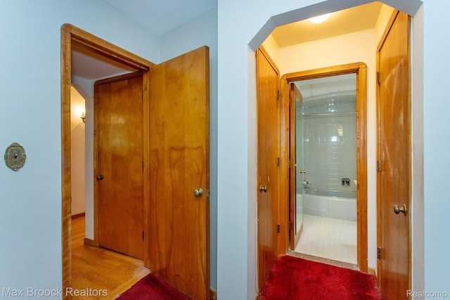 25695 York Rd, Royal Oak, MI 48067 - corridor featuring arched walkways and wood finished floors
