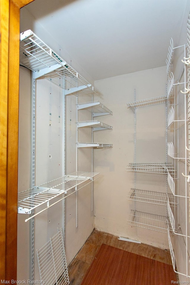 25695 York Rd, Royal Oak, MI 48067 - walk in closet featuring wood finished floors