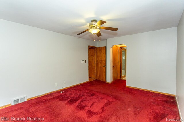 25695 York Rd, Royal Oak, MI 48067 - carpeted spare room with a ceiling fan and arched walkways