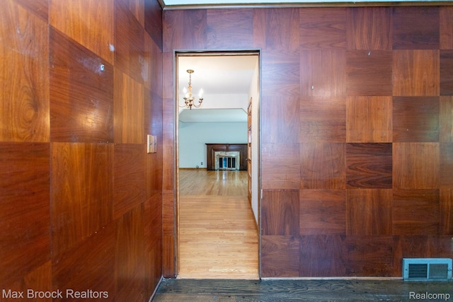 25695 York Rd, Royal Oak, MI 48067 - hall featuring a chandelier and wood finished floors