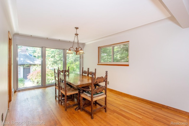 25695 York Rd, Royal Oak, MI 48067 - dining area featuring a chandelier and light wood-style flooring