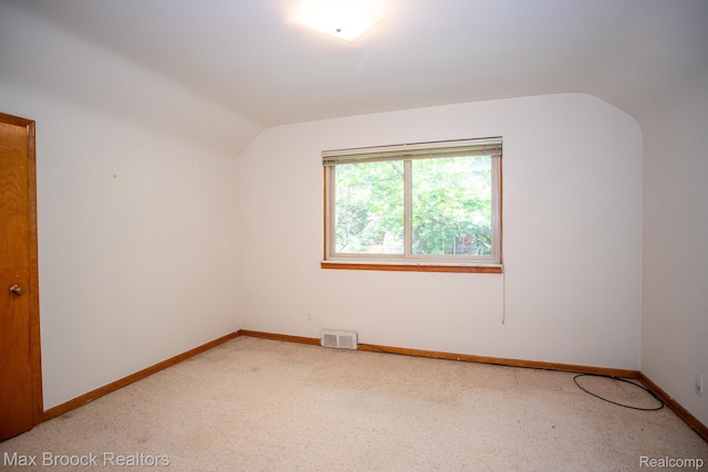 25695 York Rd, Royal Oak, MI 48067 - spare room with vaulted ceiling and carpet floors