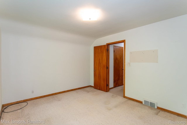25695 York Rd, Royal Oak, MI 48067 - empty room featuring lofted ceiling and light colored carpet