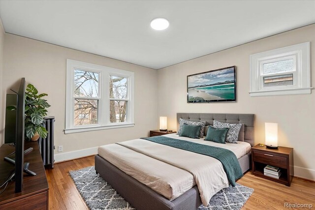 16525 Roselawn St, Detroit, MI 48221 - bedroom featuring baseboards and wood finished floors