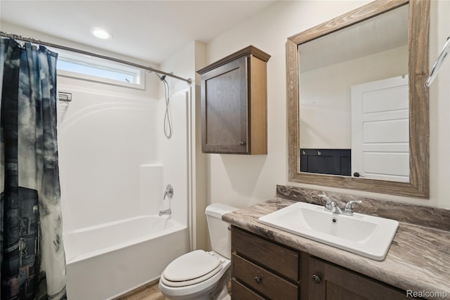 6464 Prince, Fenton, MI 48430 - full bath featuring shower / bathtub combination with curtain, vanity, toilet, and wood finished floors