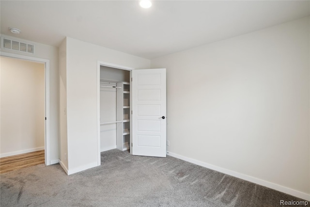 6464 Prince, Fenton, MI 48430 - unfurnished bedroom with carpet, baseboards, a closet, and recessed lighting