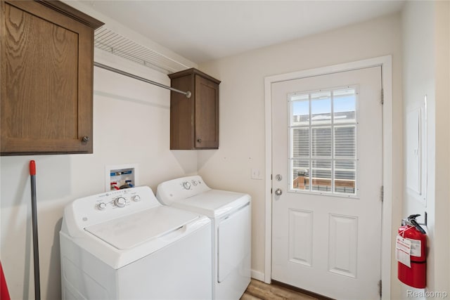 6464 Prince, Fenton, MI 48430 - laundry area with washing machine and dryer and cabinet space