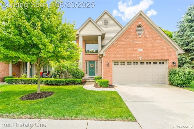 43543 Abbey Cir, Canton, MI 48187 - view of front of house featuring brick siding, a front lawn, an attached garage, and concrete driveway