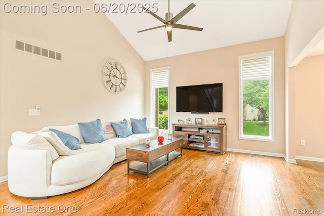 43543 Abbey Cir, Canton, MI 48187 - living room with a ceiling fan, high vaulted ceiling, plenty of natural light, and wood finished floors