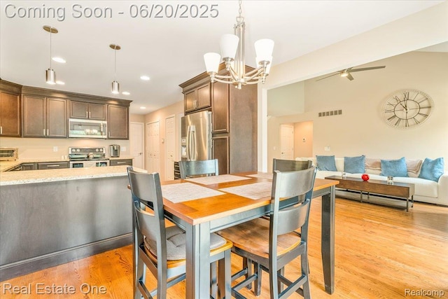 43543 Abbey Cir, Canton, MI 48187 - dining space with a chandelier, light wood-type flooring, recessed lighting, and a ceiling fan
