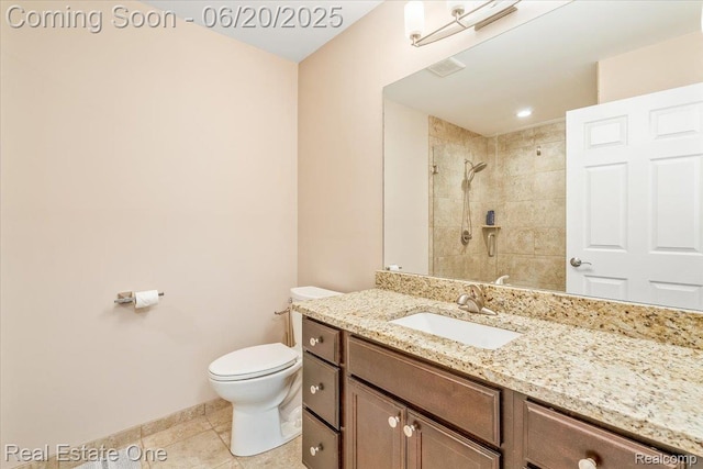 43543 Abbey Cir, Canton, MI 48187 - bathroom featuring vanity, tiled shower, and tile patterned flooring