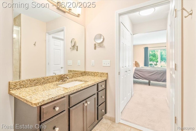 43543 Abbey Cir, Canton, MI 48187 - bathroom featuring vanity, tile patterned flooring, and ensuite bath