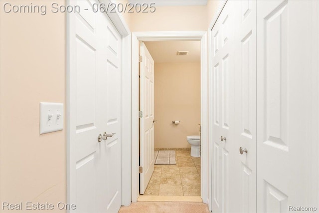 43543 Abbey Cir, Canton, MI 48187 - corridor with light tile patterned floors