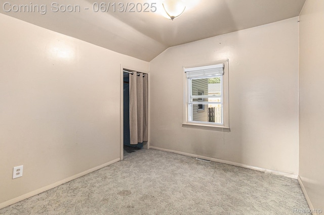 17325 Doris, Fraser, MI 48026 - carpeted spare room with baseboards and vaulted ceiling