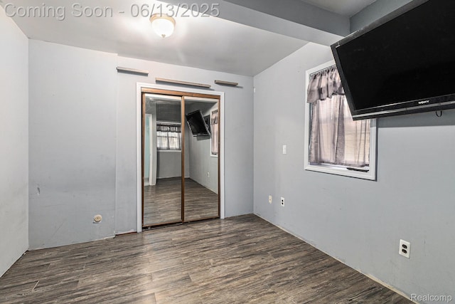 17325 Doris, Fraser, MI 48026 - unfurnished bedroom featuring wood finished floors and a closet