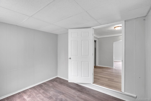 12702-12710 Kelly Rd, Detroit, MI 48224 - spare room featuring wood finished floors and a paneled ceiling