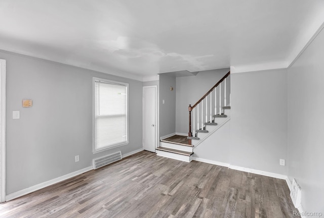 12702-12710 Kelly Rd, Detroit, MI 48224 - entryway with wood finished floors and stairway