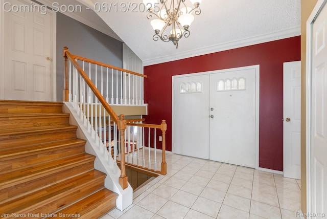 47425 Barbara Rd, Macomb, MI 48044 - tiled entrance foyer featuring a chandelier, crown molding, and stairway