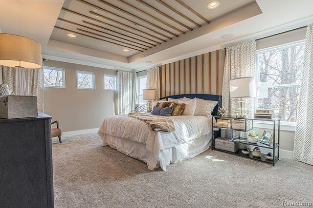 16245 Rogan Dr, Linden, MI 48451 - carpeted bedroom with a raised ceiling, baseboards, and recessed lighting