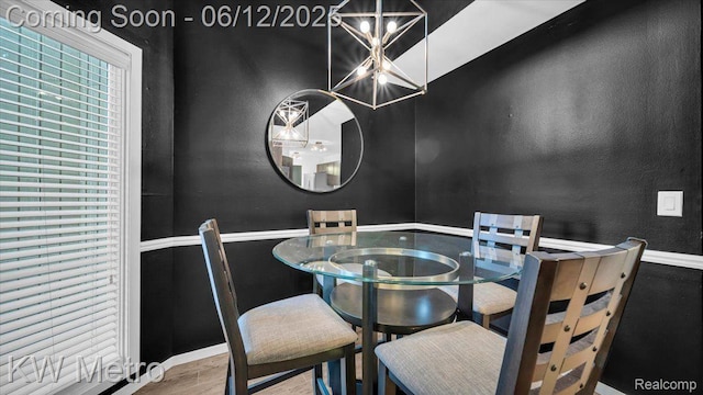 4013 Foxpointe Dr, West Bloomfield, MI 48323 - dining room featuring a chandelier and wood finished floors