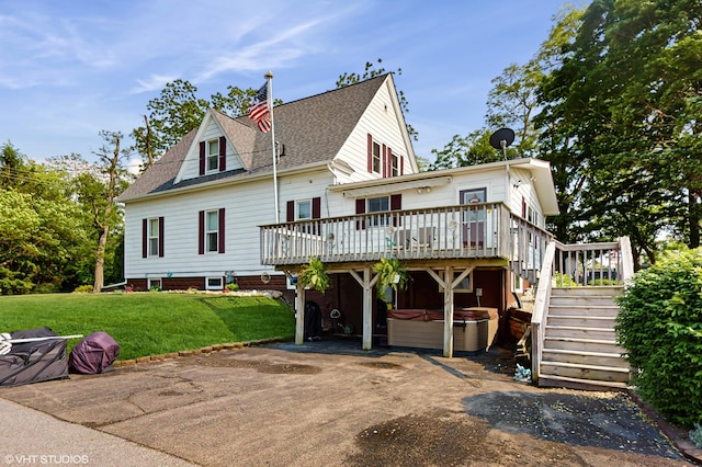 16486 Three Oaks Rd, Three Oaks, MI 49128 - view of front of property featuring a hot tub, a wooden deck, a front lawn, stairway, and roof with shingles