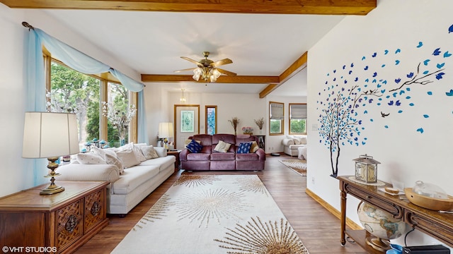 16486 Three Oaks Rd, Three Oaks, MI 49128 - living room featuring beam ceiling, wood finished floors, and ceiling fan