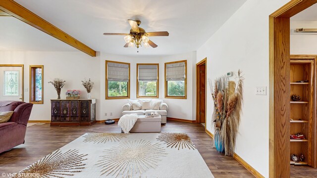 16486 Three Oaks Rd, Three Oaks, MI 49128 - bedroom with dark wood-style floors, baseboards, beam ceiling, and ceiling fan