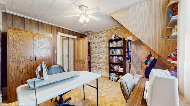 16486 Three Oaks Rd, Three Oaks, MI 49128 - office space featuring wallpapered walls, ceiling fan, and wood walls