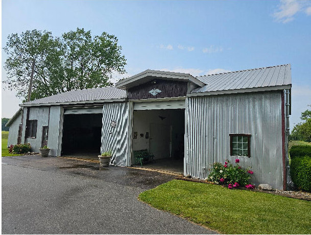 16486 Three Oaks Rd, Three Oaks, MI 49128 - view of front of home with metal roof