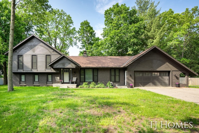 2605 Shadowbrook Dr SE, Grand Rapids, MI 49546 - tri-level home with brick siding, a garage, driveway, and a front yard