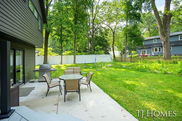 2605 Shadowbrook Dr SE, Grand Rapids, MI 49546 - view of patio with area for grilling and outdoor dining area