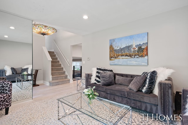 2605 Shadowbrook Dr SE, Grand Rapids, MI 49546 - living area with stairway, wood finished floors, and recessed lighting