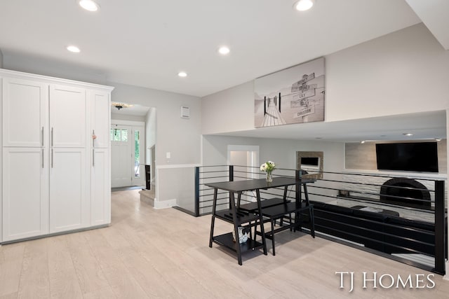 2605 Shadowbrook Dr SE, Grand Rapids, MI 49546 - hall featuring an upstairs landing, light wood-style floors, recessed lighting, and baseboards