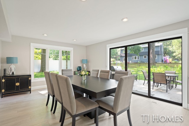 2605 Shadowbrook Dr SE, Grand Rapids, MI 49546 - dining room featuring light wood finished floors and recessed lighting