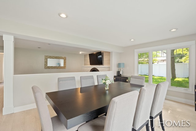 2605 Shadowbrook Dr SE, Grand Rapids, MI 49546 - dining space featuring baseboards, recessed lighting, and light wood finished floors