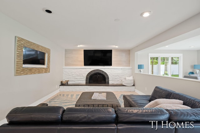 2605 Shadowbrook Dr SE, Grand Rapids, MI 49546 - living room featuring baseboards, a fireplace, and recessed lighting
