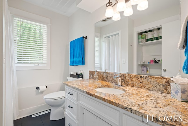 2605 Shadowbrook Dr SE, Grand Rapids, MI 49546 - full bath with tile patterned floors, vanity, and toilet