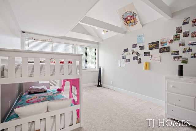 2605 Shadowbrook Dr SE, Grand Rapids, MI 49546 - bedroom featuring lofted ceiling, baseboards, and carpet flooring