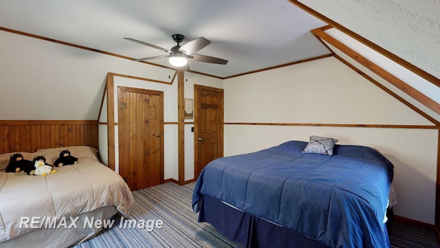 2258 High Rd, Roscommon, MI 48653 - bedroom featuring carpet flooring, a ceiling fan, lofted ceiling, wainscoting, and wood walls