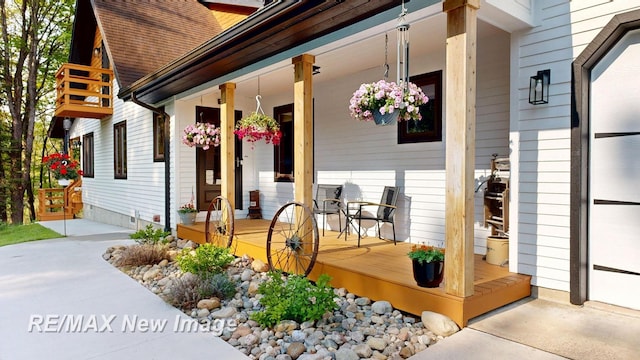 2258 High Rd, Roscommon, MI 48653 - doorway to property featuring a porch
