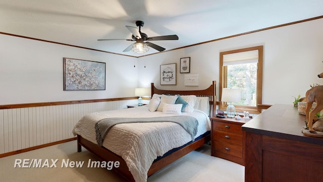 2258 High Rd, Roscommon, MI 48653 - bedroom featuring light colored carpet, ceiling fan, and ornamental molding