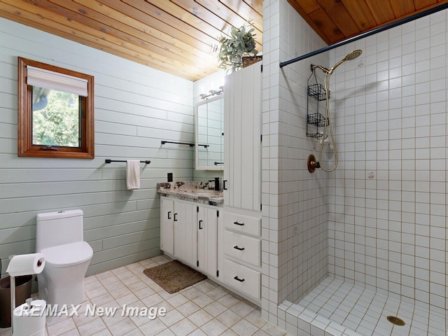 2258 High Rd, Roscommon, MI 48653 - bathroom with wooden ceiling, vanity, tile patterned flooring, and tiled shower