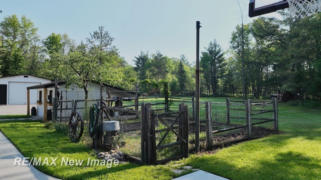 2258 High Rd, Roscommon, MI 48653 - view of yard with an outbuilding and a detached garage