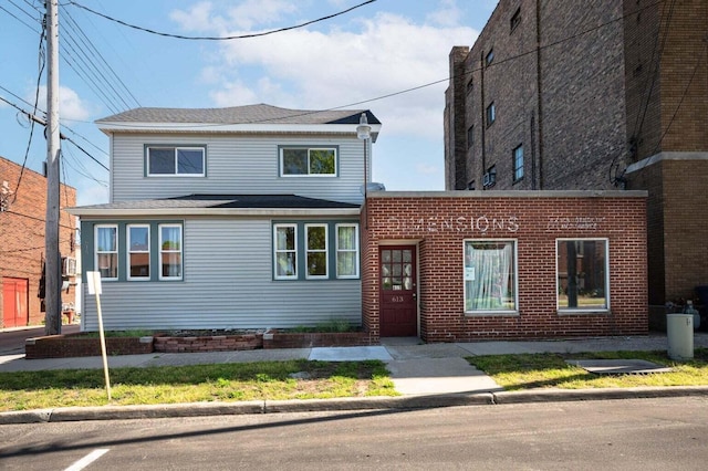 617 Elm St, Saint Joseph, MI 49085 - traditional-style home featuring brick siding