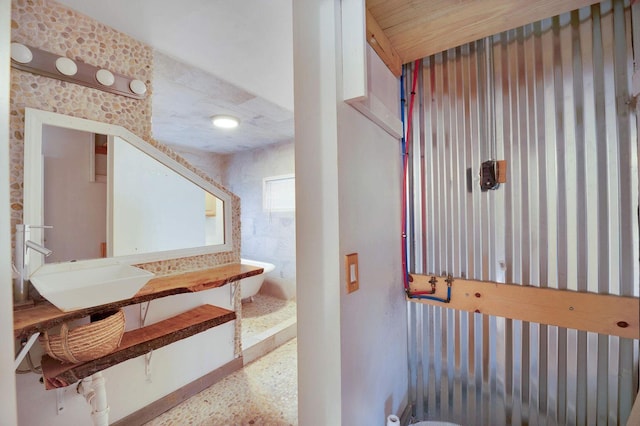 617 Elm St, Saint Joseph, MI 49085 - hall with speckle patterned floor and a sink