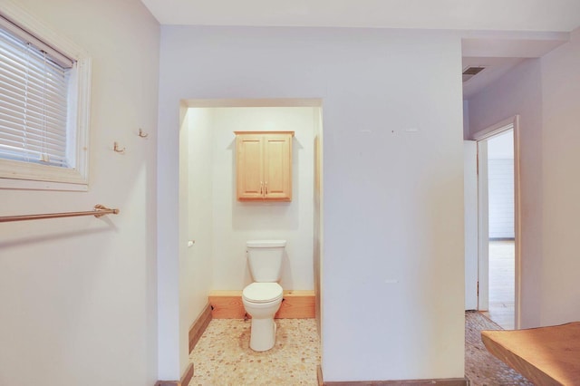 617 Elm St, Saint Joseph, MI 49085 - bathroom with toilet and baseboards