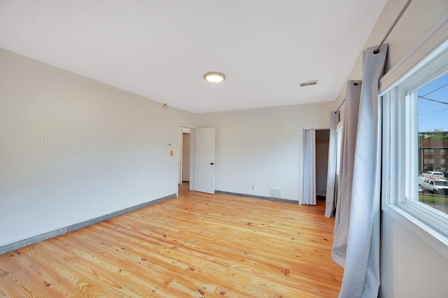 617 Elm St, Saint Joseph, MI 49085 - unfurnished room featuring light wood-style flooring and baseboards