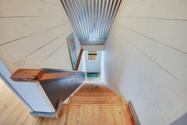 617 Elm St, Saint Joseph, MI 49085 - staircase with wood finished floors and wooden walls