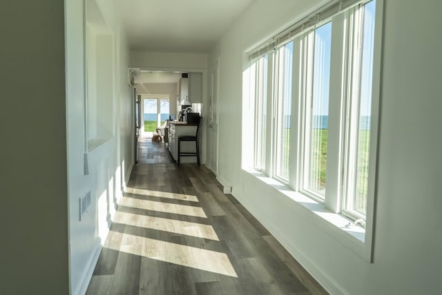 37252 Jefferson Ave, Harrison Township, MI 48045 - hall featuring dark wood finished floors and baseboards