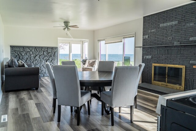 37252 Jefferson Ave, Harrison Township, MI 48045 - dining space featuring ceiling fan, plenty of natural light, wood finished floors, and a water view